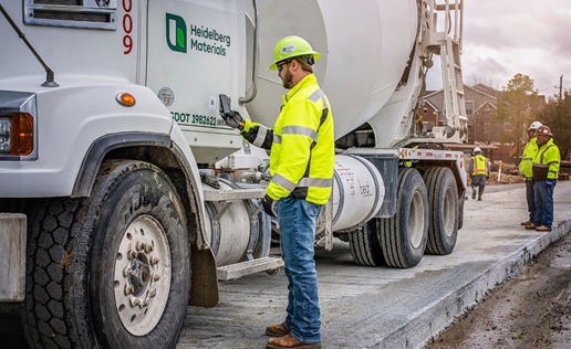 MQT 2 man scanning qr code on truck